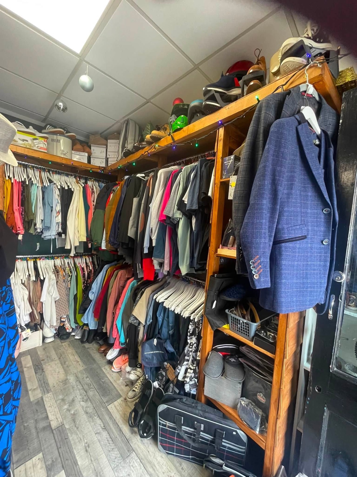 Inside The People's Angels shop, rails of clothing and accessories