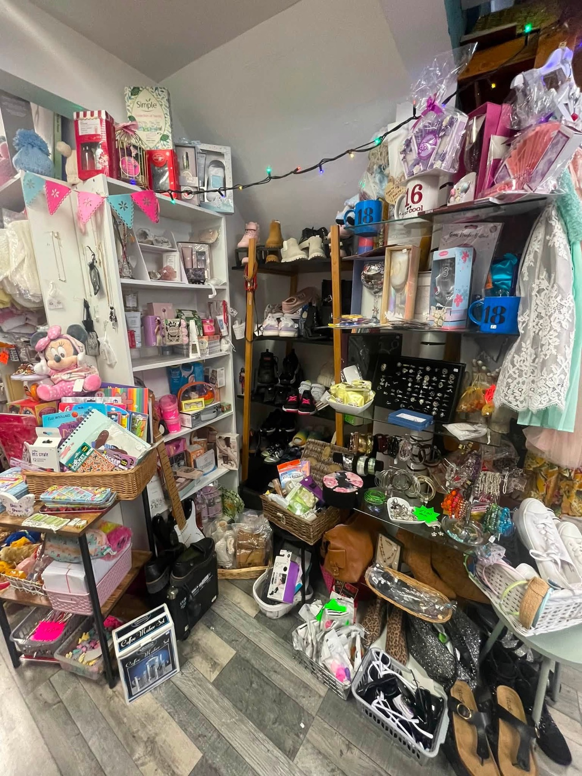 Shelves of gifts and accessories inside The People's Angels shop